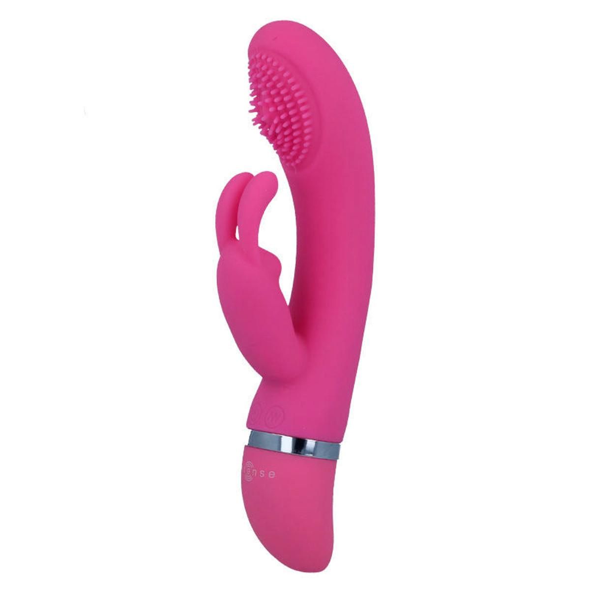 Pinkfarbener Vibrator mit Hasenohren-Design. Oberteil mit Noppen, unterer Teil mit silbernem Ring.