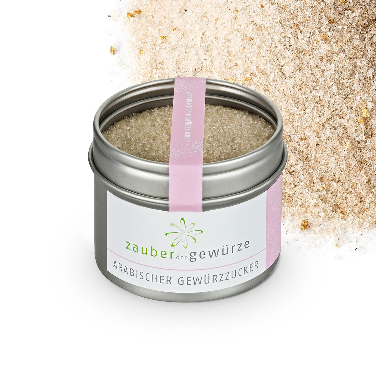 Geöffnete runde Dose mit Gewürzzucker. Rosa Band mit Schriftzug. Aufschrift: Zauber der Gewürze Arabischer Gewürzzucker.