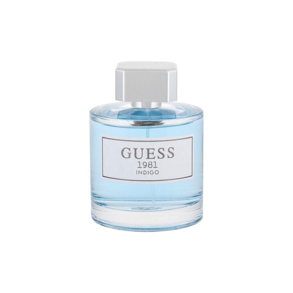 Glasflakon mit hellblauem Inhalt. Weißes Etikett mit "GUESS 1981 INDIGO". Weißer Verschluss.