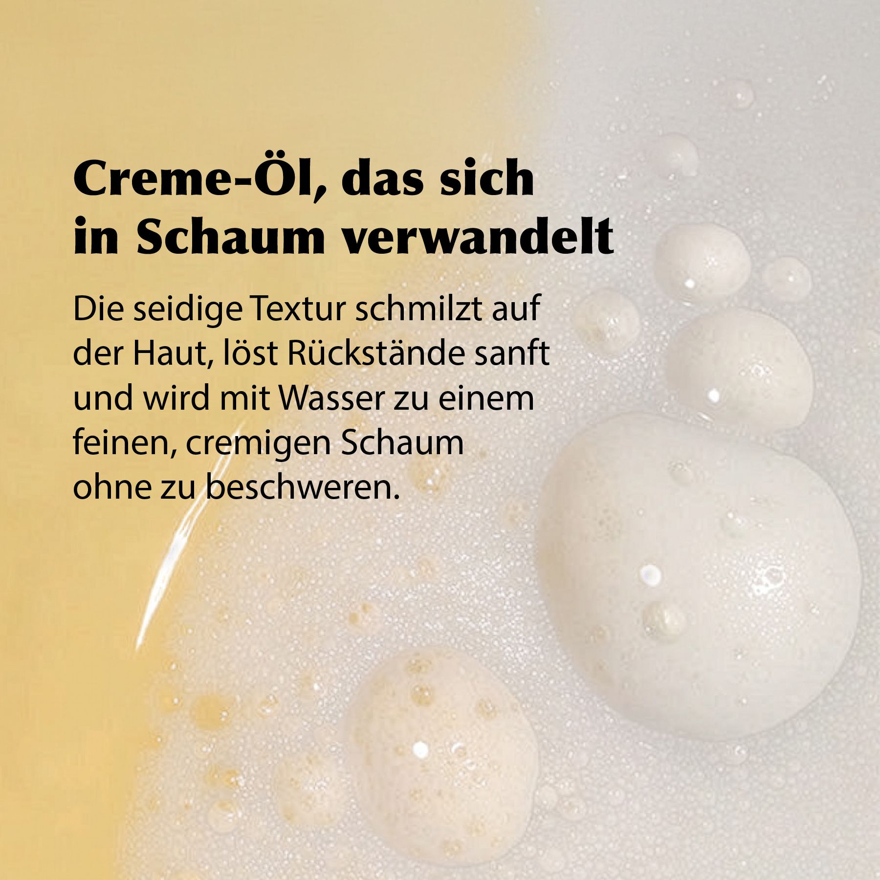 Nahaufnahme von Schaum. Weiße, cremige Textur. Einige Blasen. Text: Creme-Öl, das sich in Schaum verwandelt.