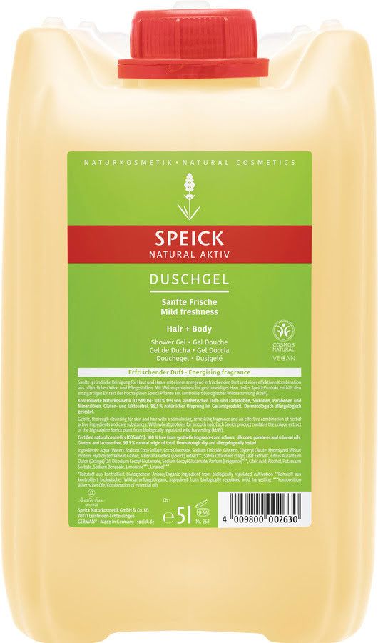 Große, gelbe Flasche Speick Duschgel. Roter Deckel. Grünes Etikett mit Produktinformationen und Vegan-Siegel.