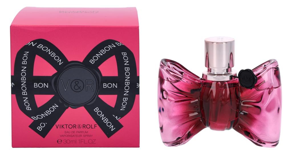 Rosa Flakon in Schleifenform mit silbernem Verschluss. Daneben eine rosa Schachtel mit schwarzer Schleife und Schriftzug BONBON.