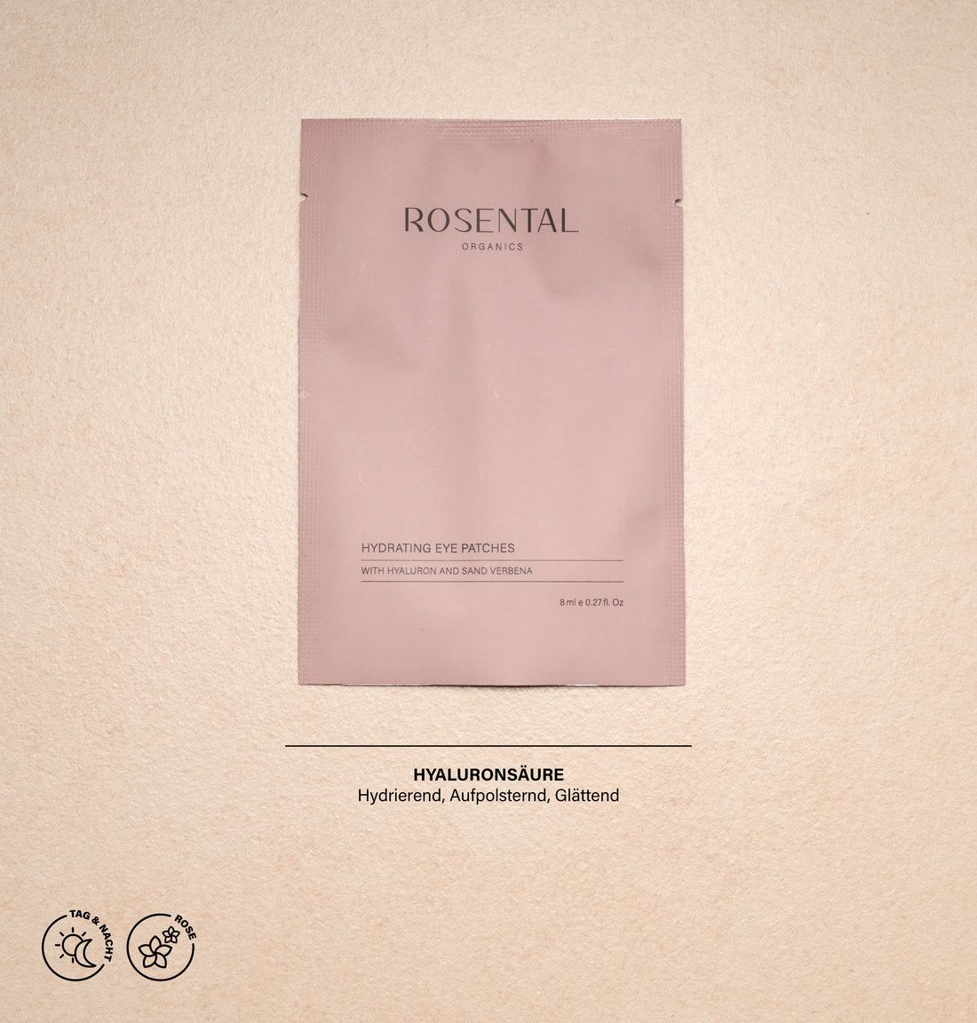 Rosa Verpackung mit Produktnamen und Inhaltsstoffen. Text: ROSENTAL ORGANICS, Hydrating Eye Patches, Hyaluron und Sand Verbena. Text: HYALURONSÄURE.