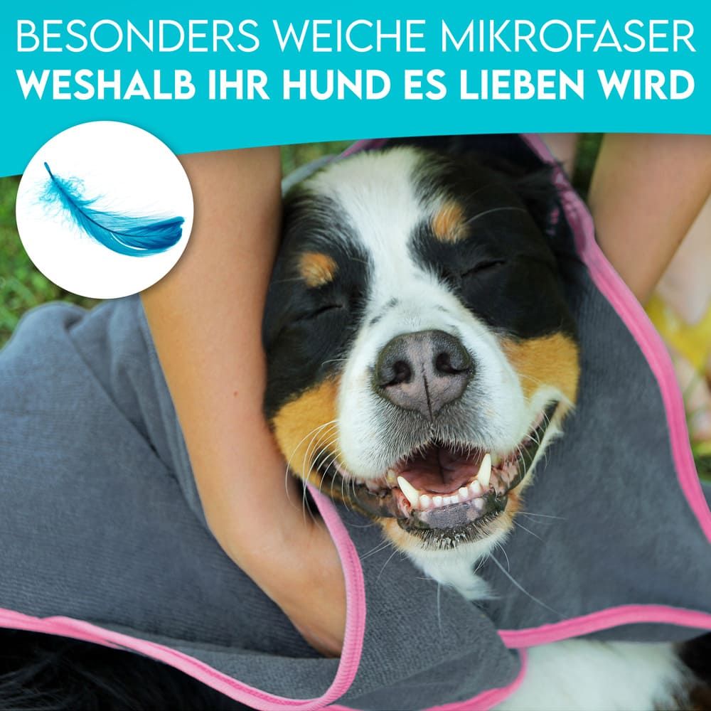Hund wird mit grauem Handtuch abgetrocknet. Text: Besonders weiche Mikrofaser, weshalb Ihr Hund es lieben wird.