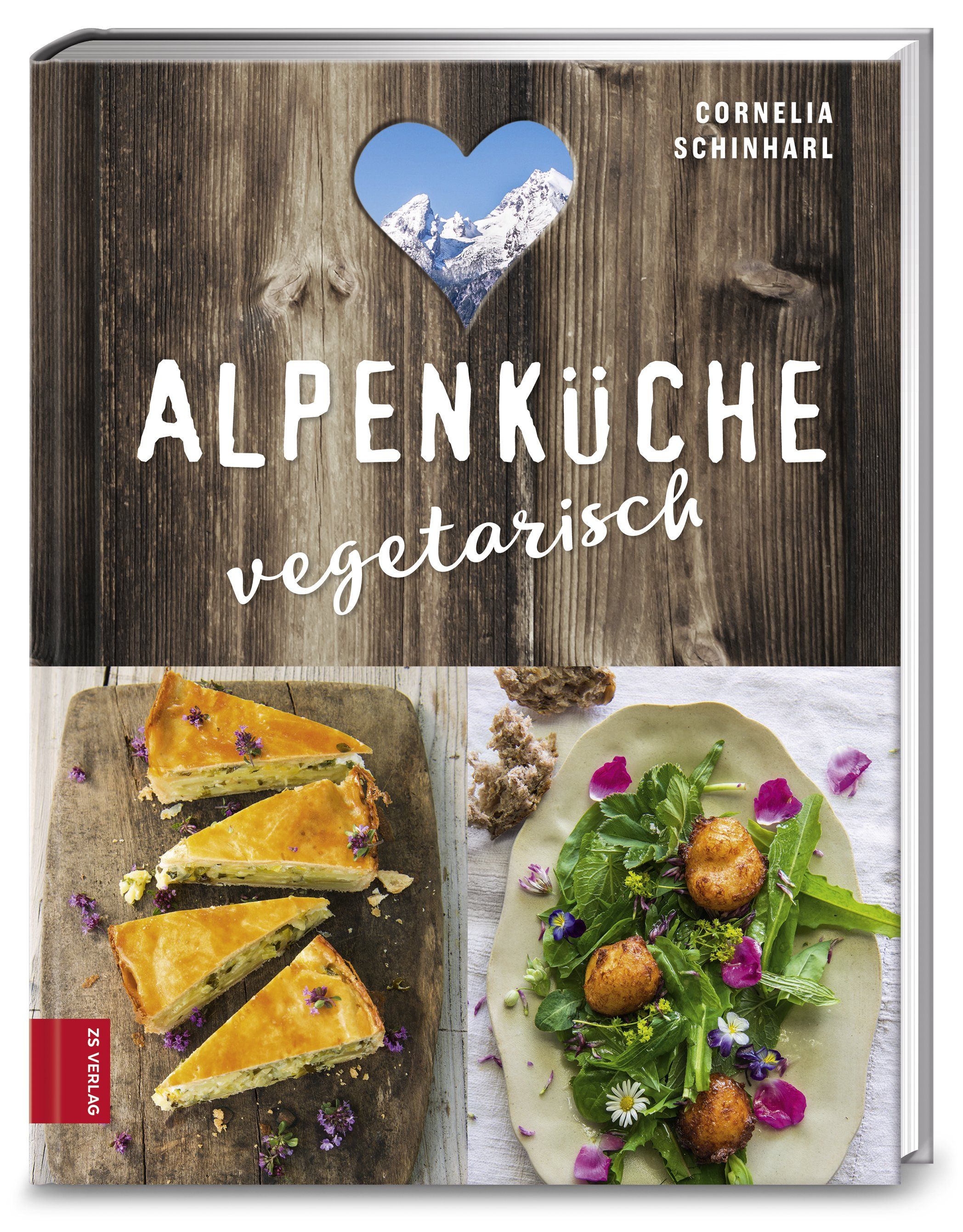 Buchcover mit Holzoptik, Herz-Ausschnitt mit Bergpanorama. Titel: Alpenküche vegetarisch. Autorin: Cornelia Schinharl. Auf dem Cover sind Speisen abgebildet.
