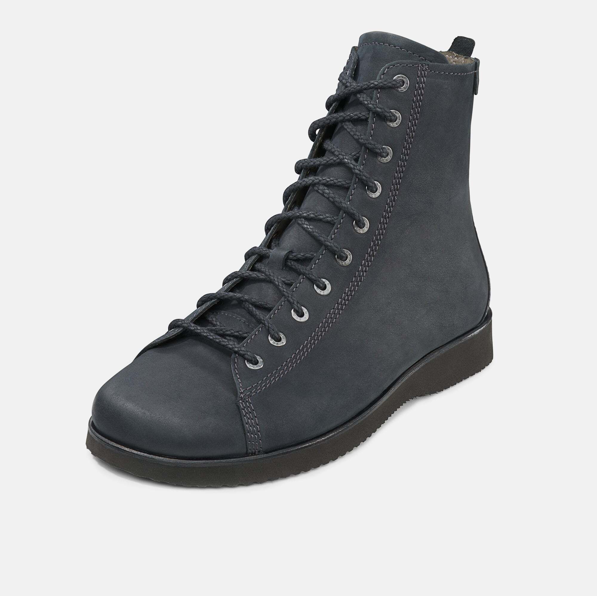 Dunkelblaue Stiefelette mit Schnürung und flacher Sohle. Seitliche Schnürung, Ösen und Schnürsenkel.