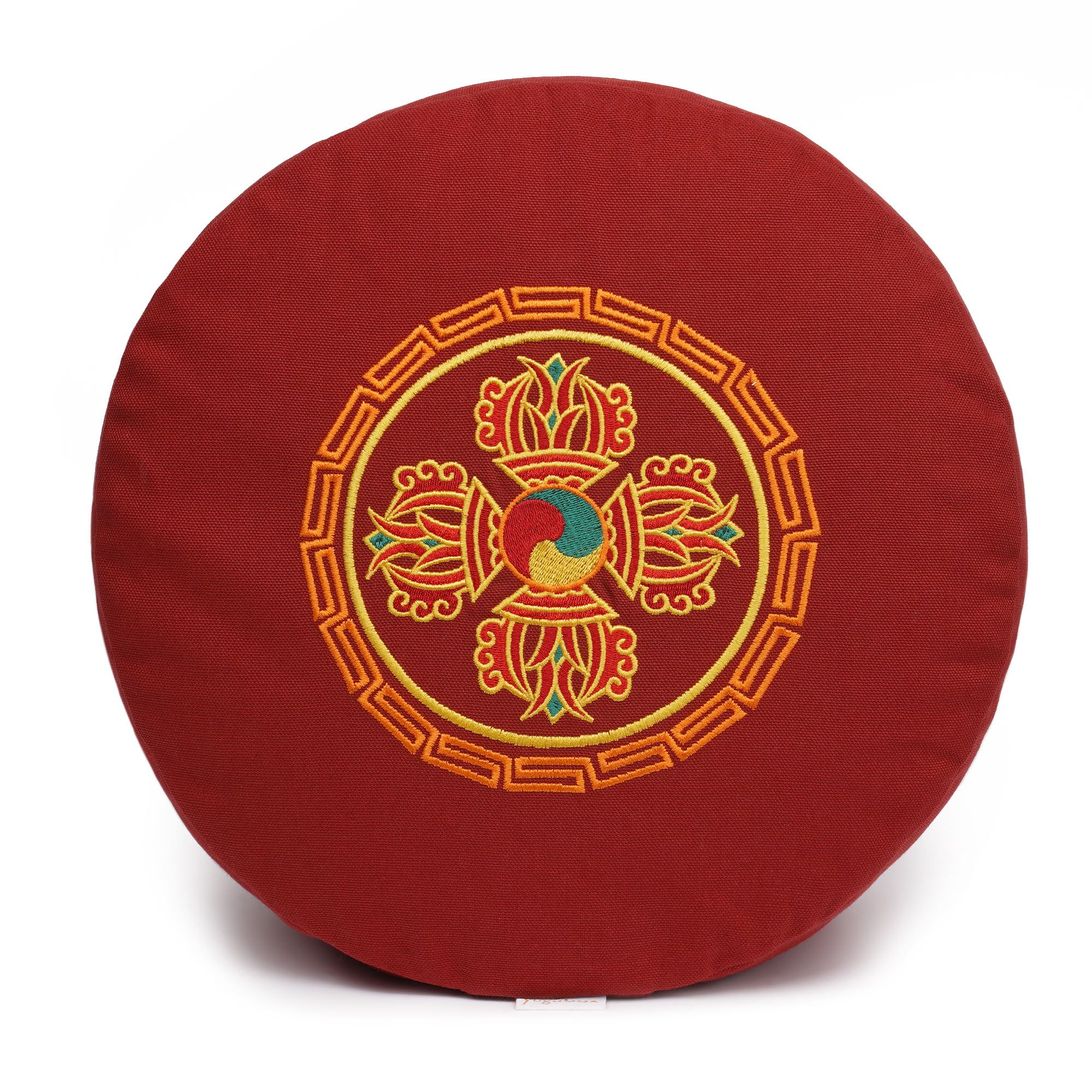 Rundes Meditationskissen in bordeauxrot mit zentral eingesticktem Glückssitz®-Symbol.