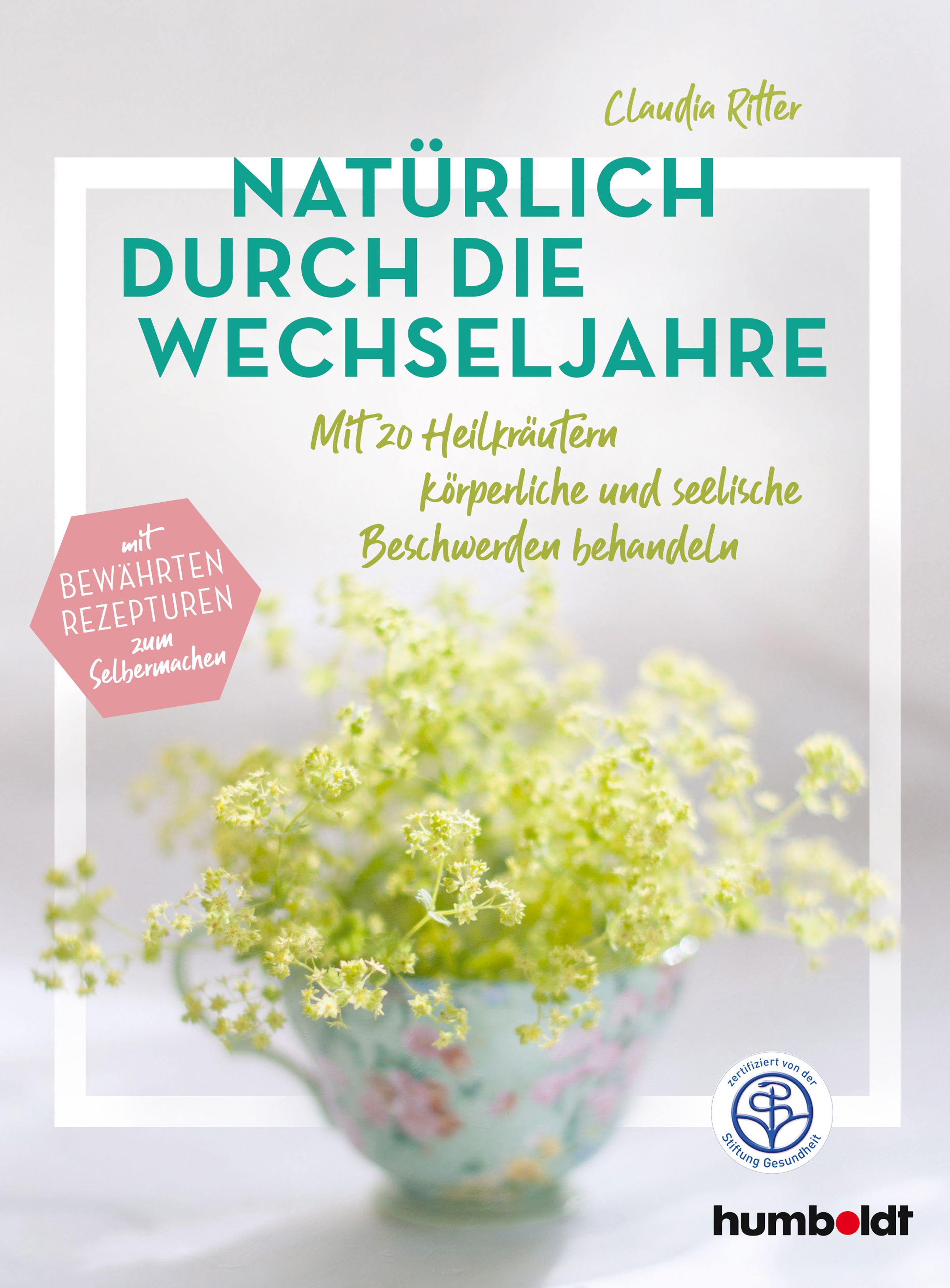 Buchcover: "Natürlich durch die Wechseljahre". Titel in Türkis, Autorin Claudia Ritter. Blumen in Tasse. Logo der Stiftung Gesundheit.
