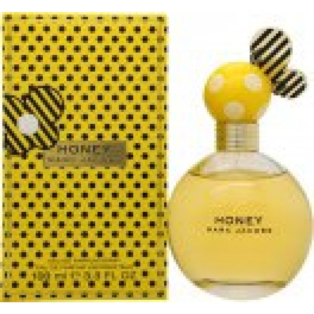 Gelbe Schachtel mit schwarzen Punkten und Flakon. Flakon mit gelbem Körper, weißen Punkten und goldfarbenem Hals. "HONEY" und "MARC JACOBS".