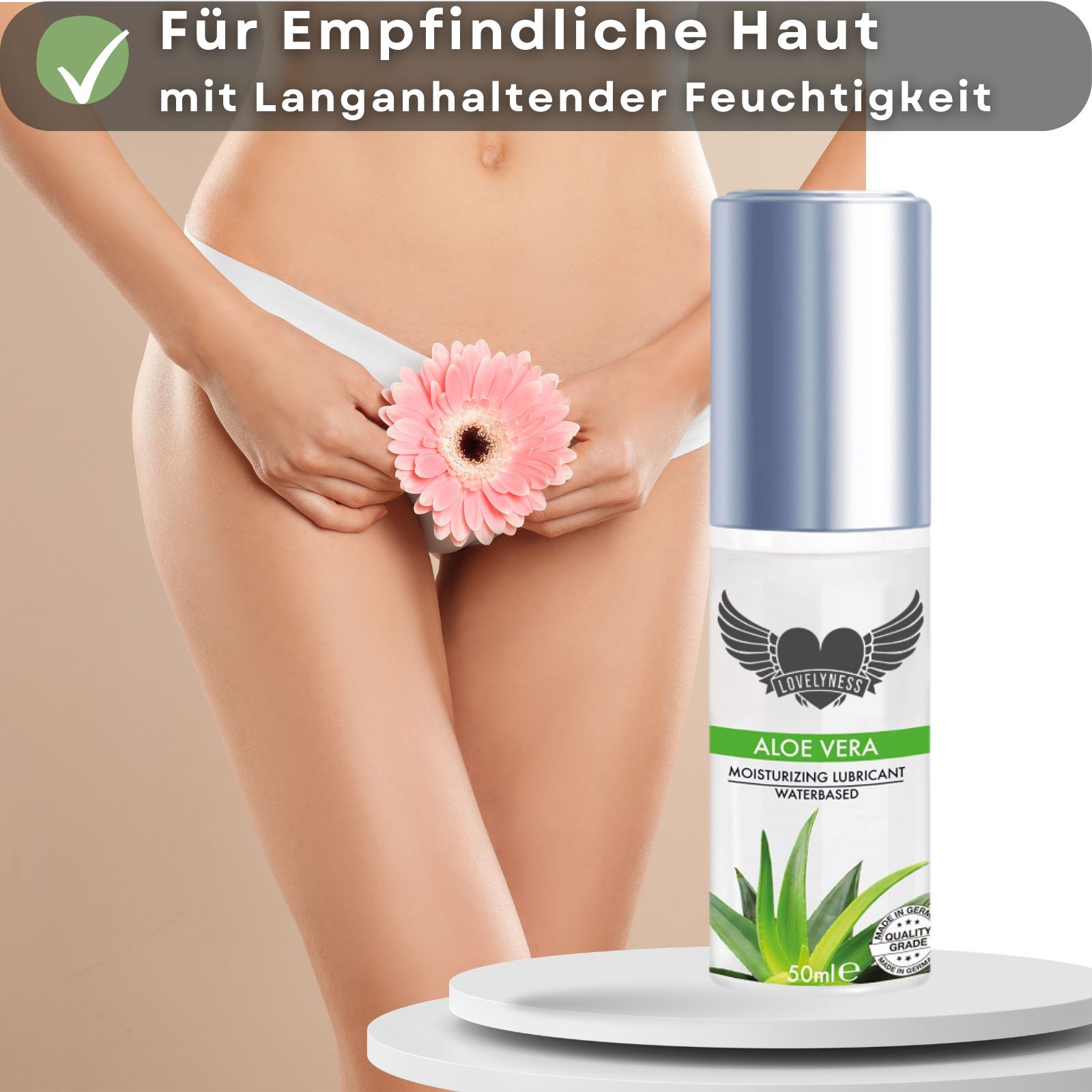 Gleitgel-Flasche mit Aloe Vera. Frau mit Blume. Text: Für empfindliche Haut mit langanhaltender Feuchtigkeit.