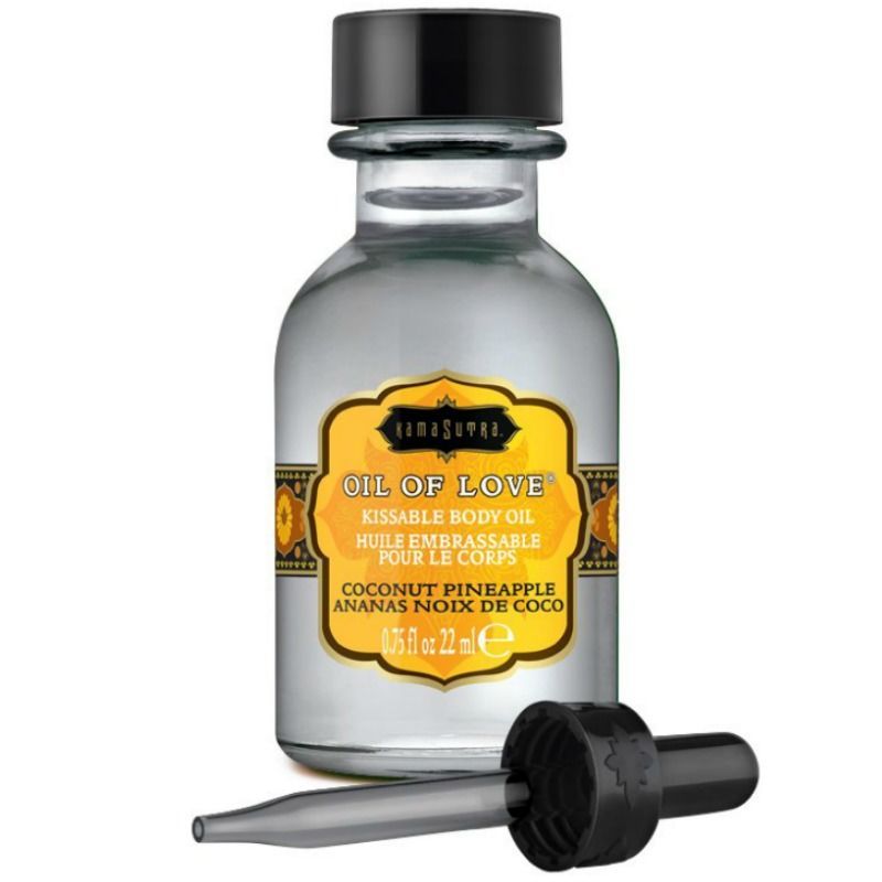 Eine Flasche mit Pipette. Aufschrift: Oil of Love, Kokosnuss Ananas. 0.75 fl oz 22 ml.