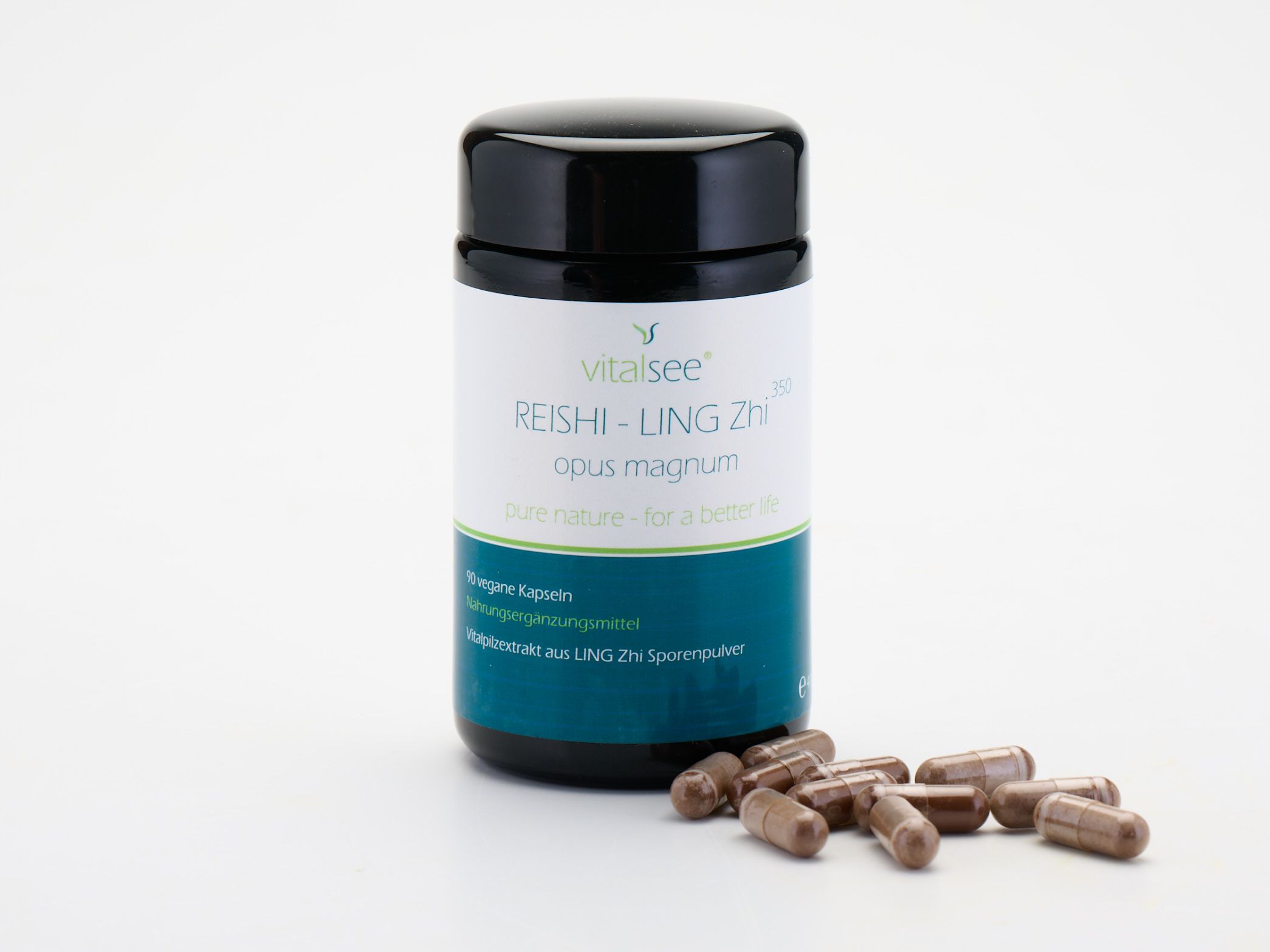 Dose mit Kapseln daneben. Kapseln in brauner Farbe. Dose mit weißem Etikett. Text: Vitalsee, REISHI - LING ZHI opus magnum.