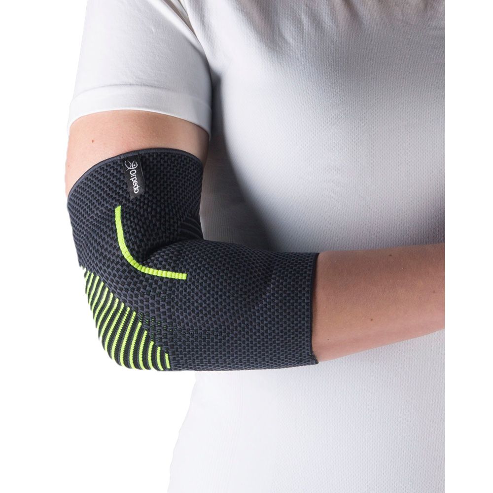 Ellbogenbandage, schwarz. Mit gelben Akzenten und Logo. Am Arm getragen.