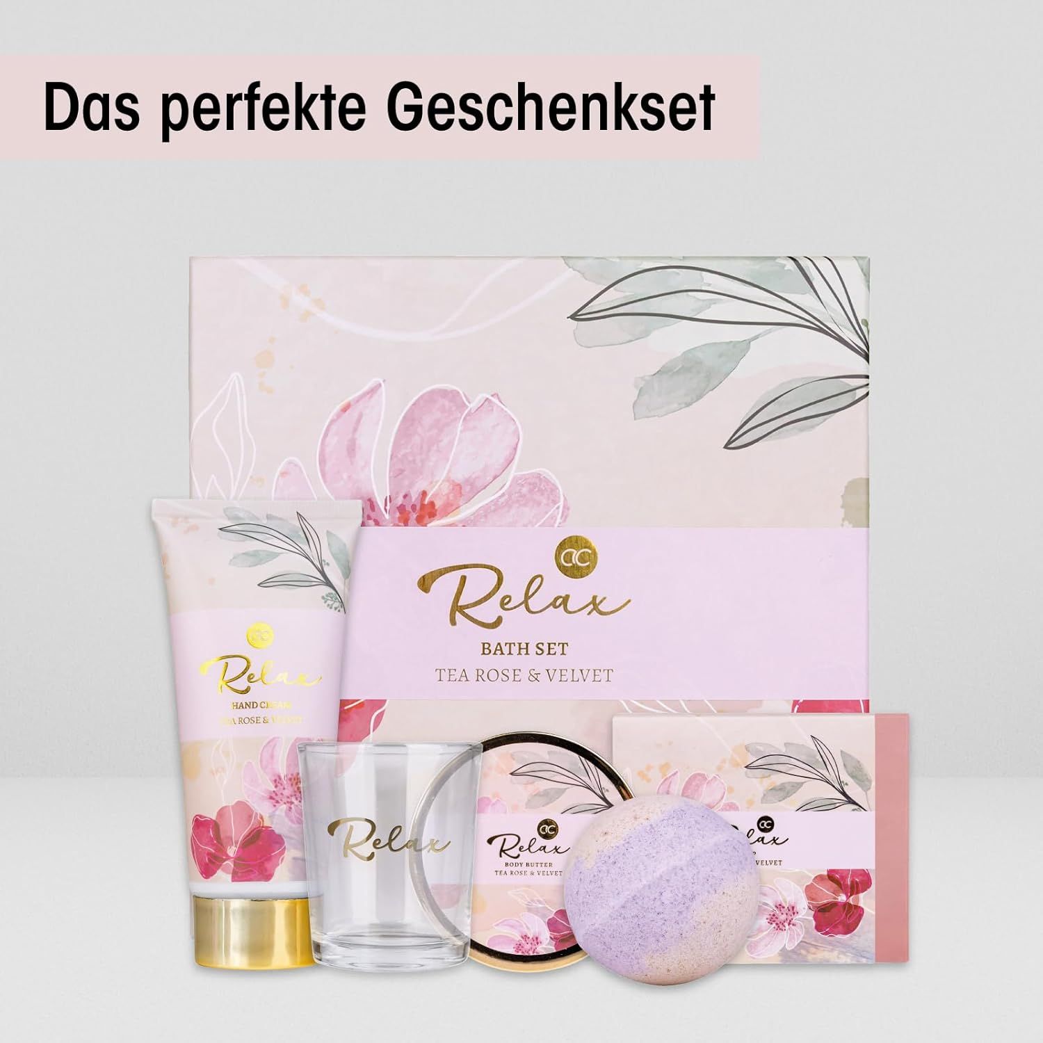 Geschenkset mit Bade- und Pflegeprodukten. Enthält Handcreme, Glas, Seife, Badekugel und Creme. Mit Schriftzug 'Das perfekte Geschenkset'.