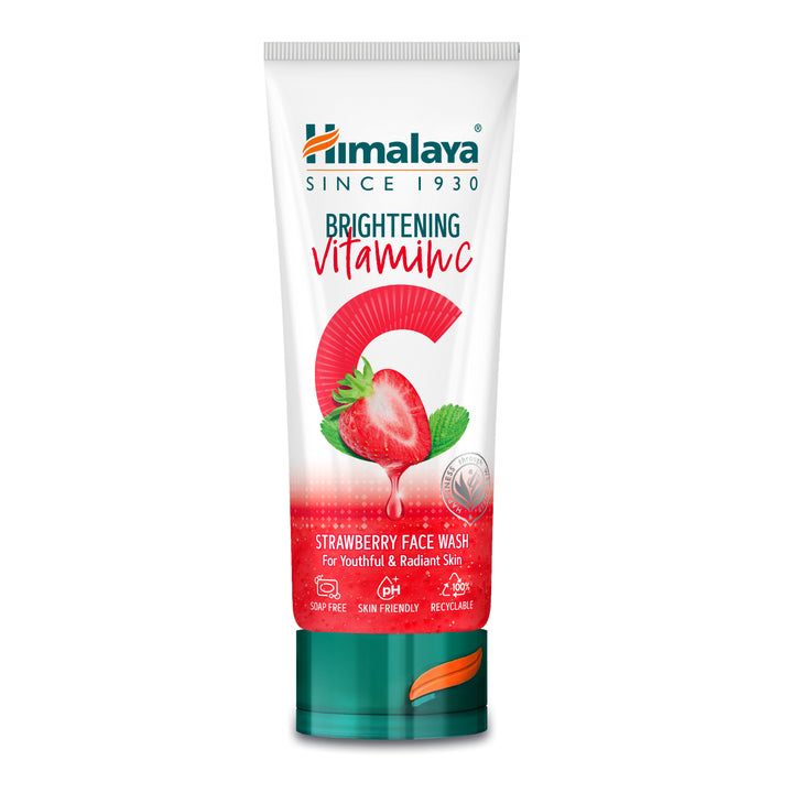 Weiß-rote Tube mit Himalaya-Logo, Erdbeer-Illustration und Schriftzug Vitamin C. Produktname: Strawberry Face Wash.