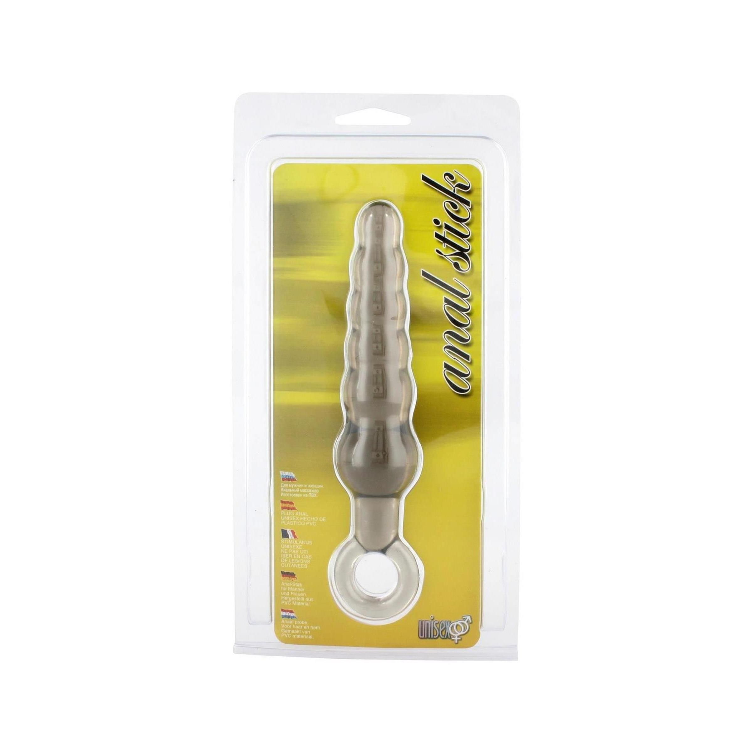 Anal Stick in Blisterverpackung. Produktname auf Verpackung. Geriffelte Oberfläche, Ring am Ende.