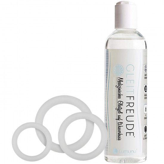 Drei weiße Silikonringe und eine Flasche Gleitgel. Auf der Flasche steht "Gleitfreude" und "Medizinisches Gleitgel auf Wasserbasis".