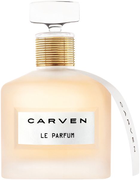 Parfümflakon mit weißem Etikett und Schriftzug CARVEN LE PARFUM. Goldfarbener Hals, transparenter Verschluss. Weißes Etikett mit Produktnamen.
