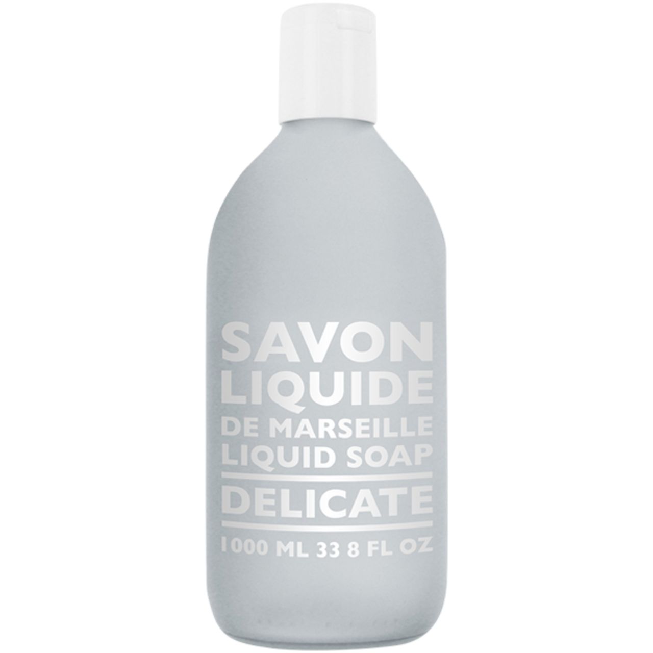 Graue Flasche mit weißem Deckel. Aufschrift: Savon Liquide, De Marseille, Liquid Soap, Delicate. 1000 ml.
