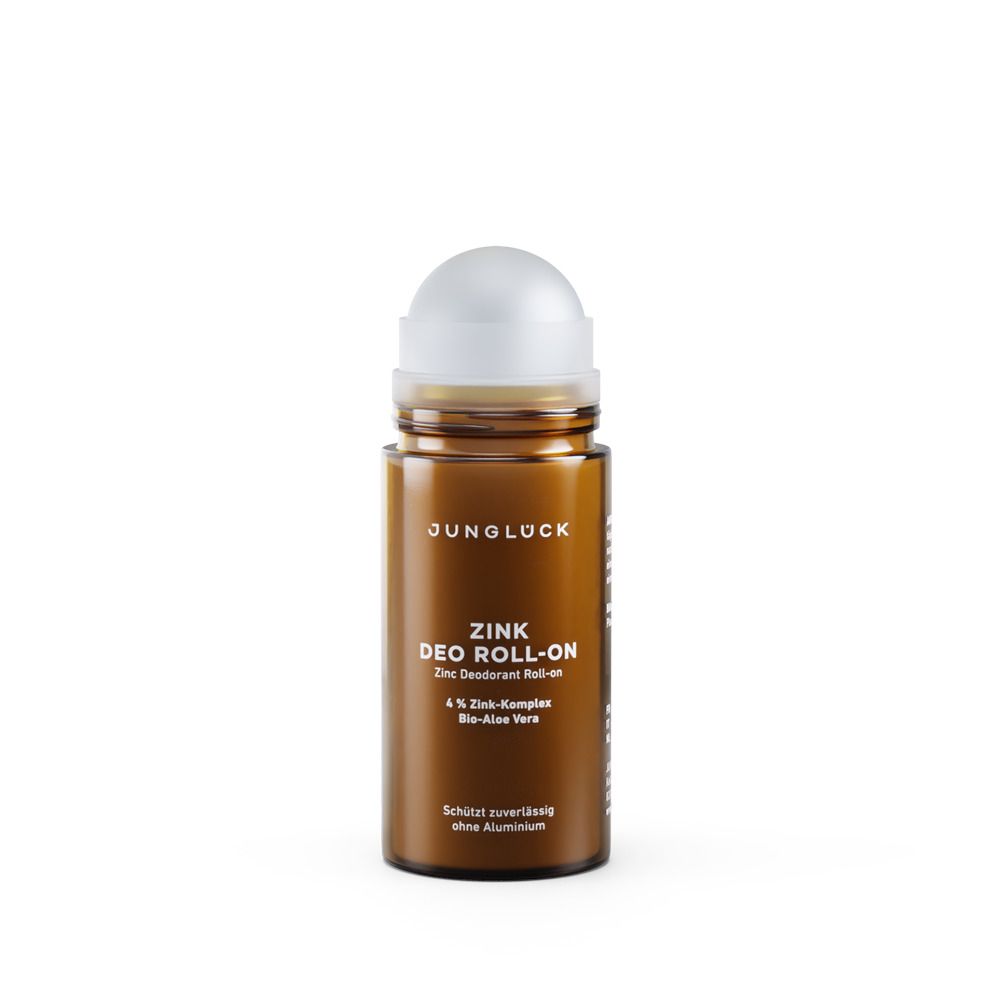 Braune Roll-On-Flasche mit weißem Deckel. Aufschrift: JUNGLÜCK ZINK DEO ROLL-ON. 4% Zink-Komplex, Bio-Aloe Vera. Ohne Aluminium.