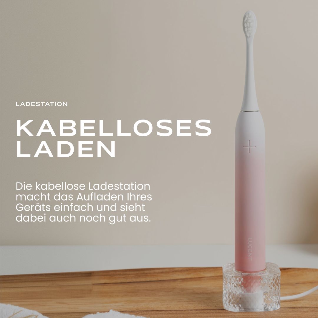 Drei Be Lucent Prism Sonic Elektrische Zahnbürsten in Rosa, Grün und Weiß.