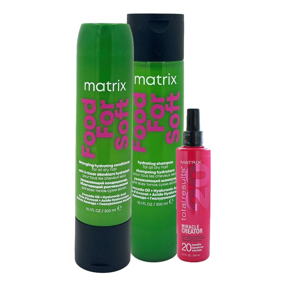 Drei Haarprodukte: Shampoo, Conditioner und Spray. Grün- und pinkfarbene Flaschen mit Text. Marke: Matrix.