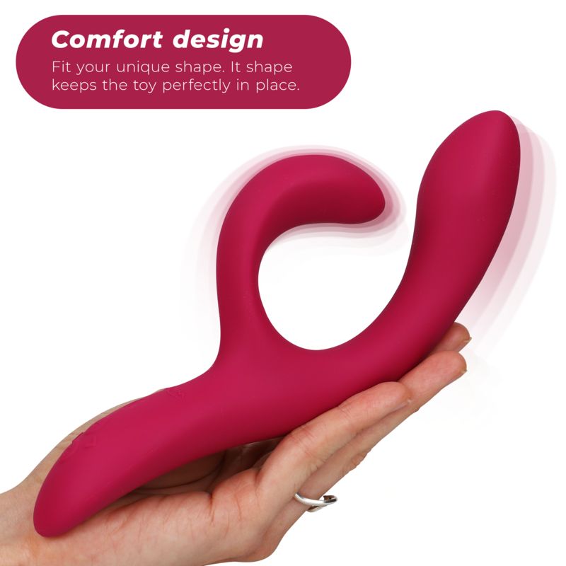 Rosa Vibrator in Hand gehalten. Geschwungene Form. Text: Comfort design. Passform.
