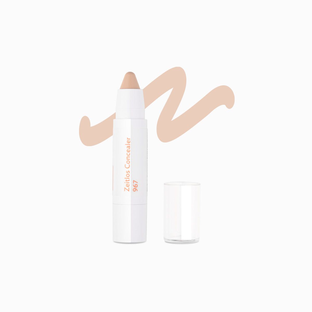 Weißer Concealer-Stift mit geöffneter Kappe und Farbstrich. Aufschrift: Zeitlos Concealer 967.