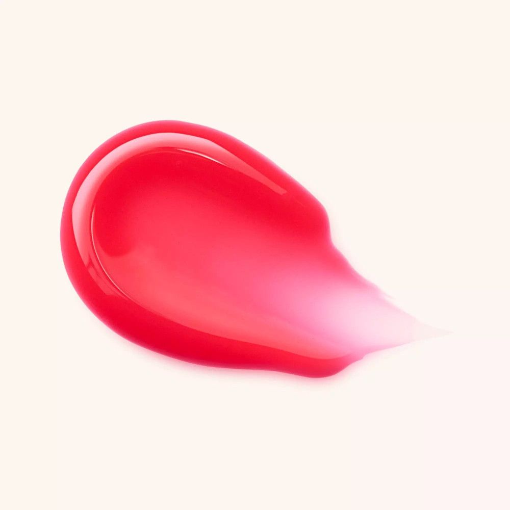 Ein leuchtend roter Gel-Swatch mit einem glänzenden Finish, der sich zu einer transparenten Spitze verjüngt.