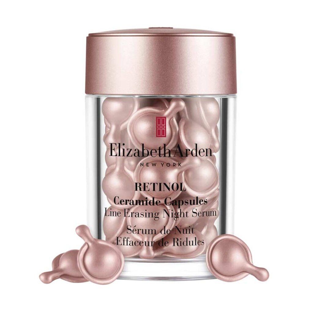 Behälter mit rosa Kapseln. Aufschrift: Elizabeth Arden, Retinol Ceramide Capsules, Line Erasing Night Serum.