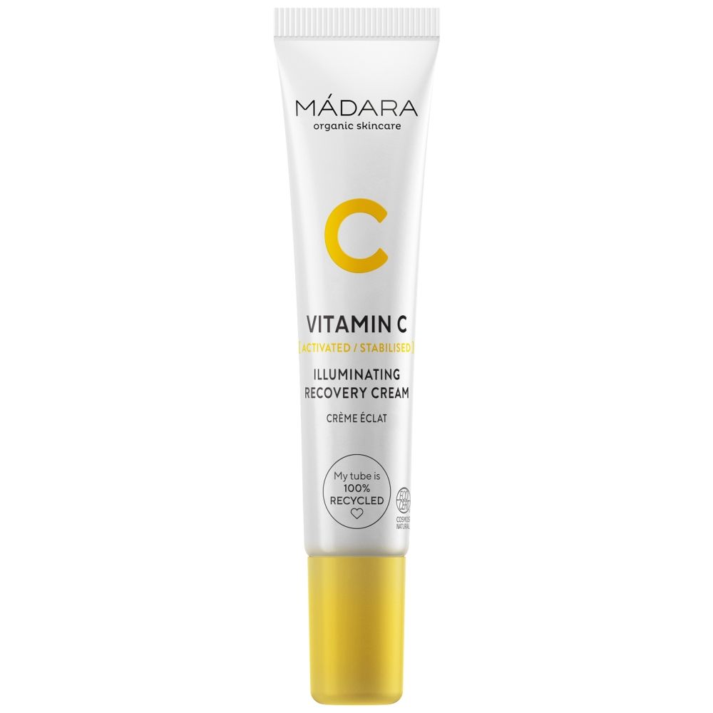 Weiße Tube mit gelbem Deckel. Aufschrift: MÁDARA, Vitamin C, Illuminating Recovery Cream. Text: My tube is 100% recycled.