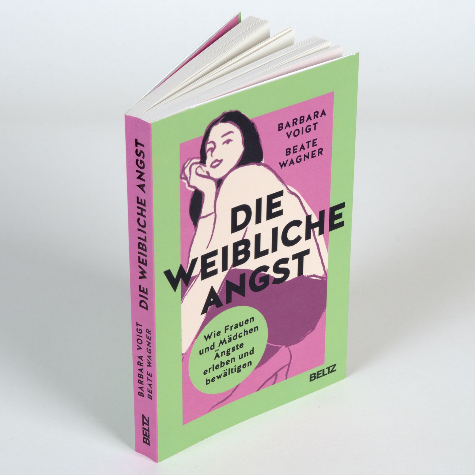 Buch "Die weibliche Angst" mit geöffneten Seiten. Cover zeigt Illustration einer Frau. Autoren: Voigt, Wagner. Verlag: Beltz.