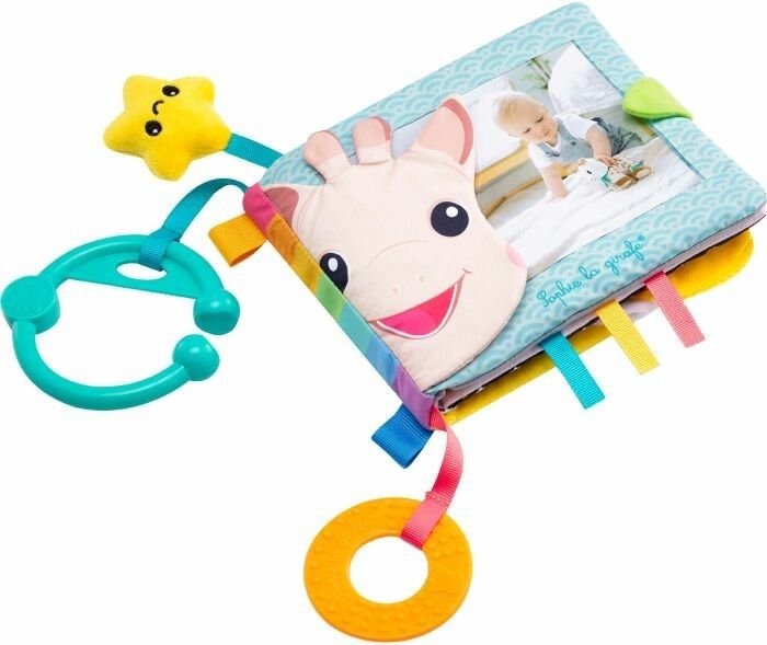 Entdeckerbuch mit Giraffen-Gesicht, Foto-Rahmen, bunten Bändern und Anhängern. Marke: Sophie la girafe.