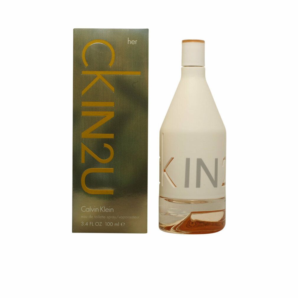 Parfümflakon und Verpackung. Flakon weiß mit "ck IN2U". Verpackung goldfarben mit "CK IN2U her".