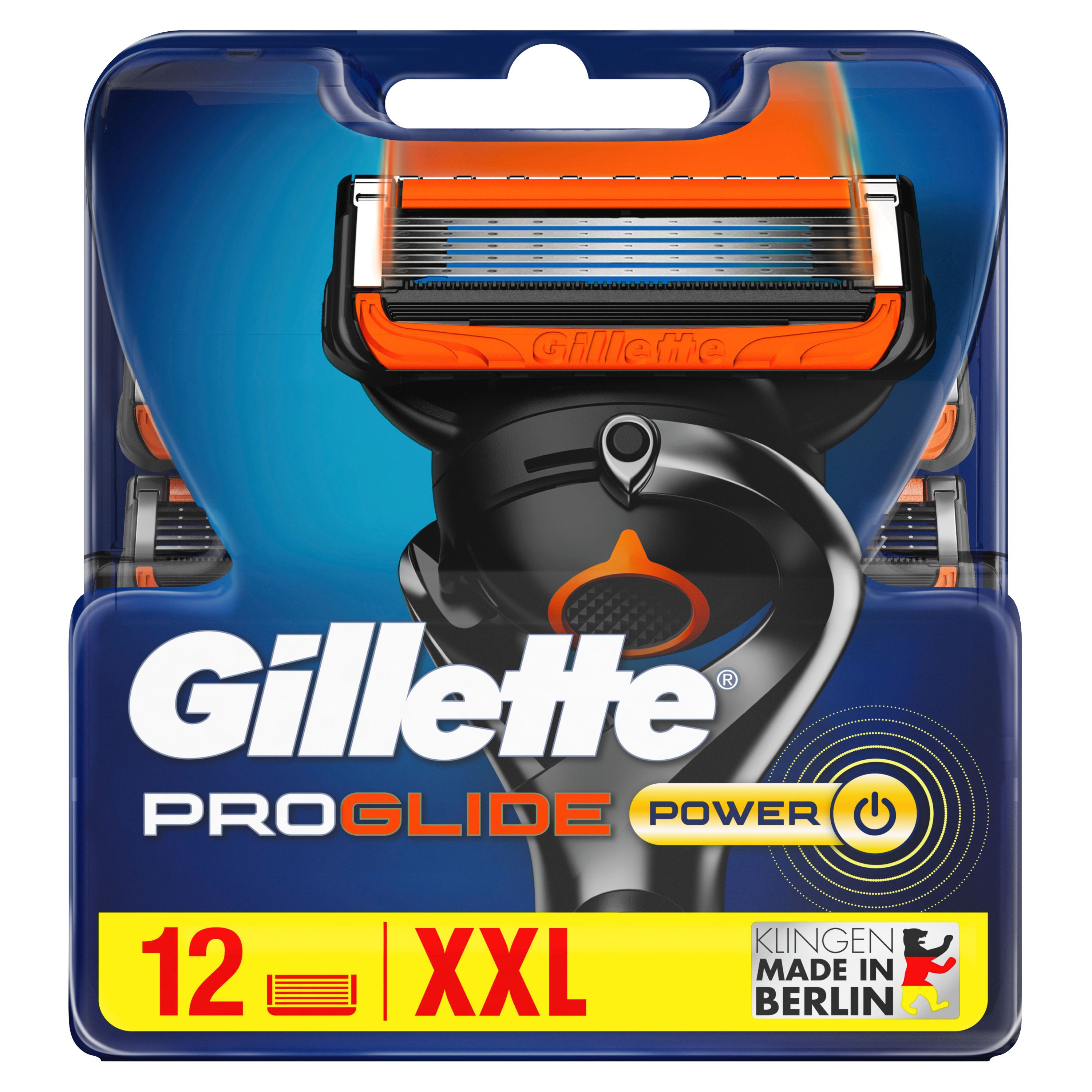 Gillette ProGlide Power Ersatzklingen. 12 Klingen in Verpackung. Orange und schwarze Rasierklingen. Text: XXL. Hergestellt in Berlin.
