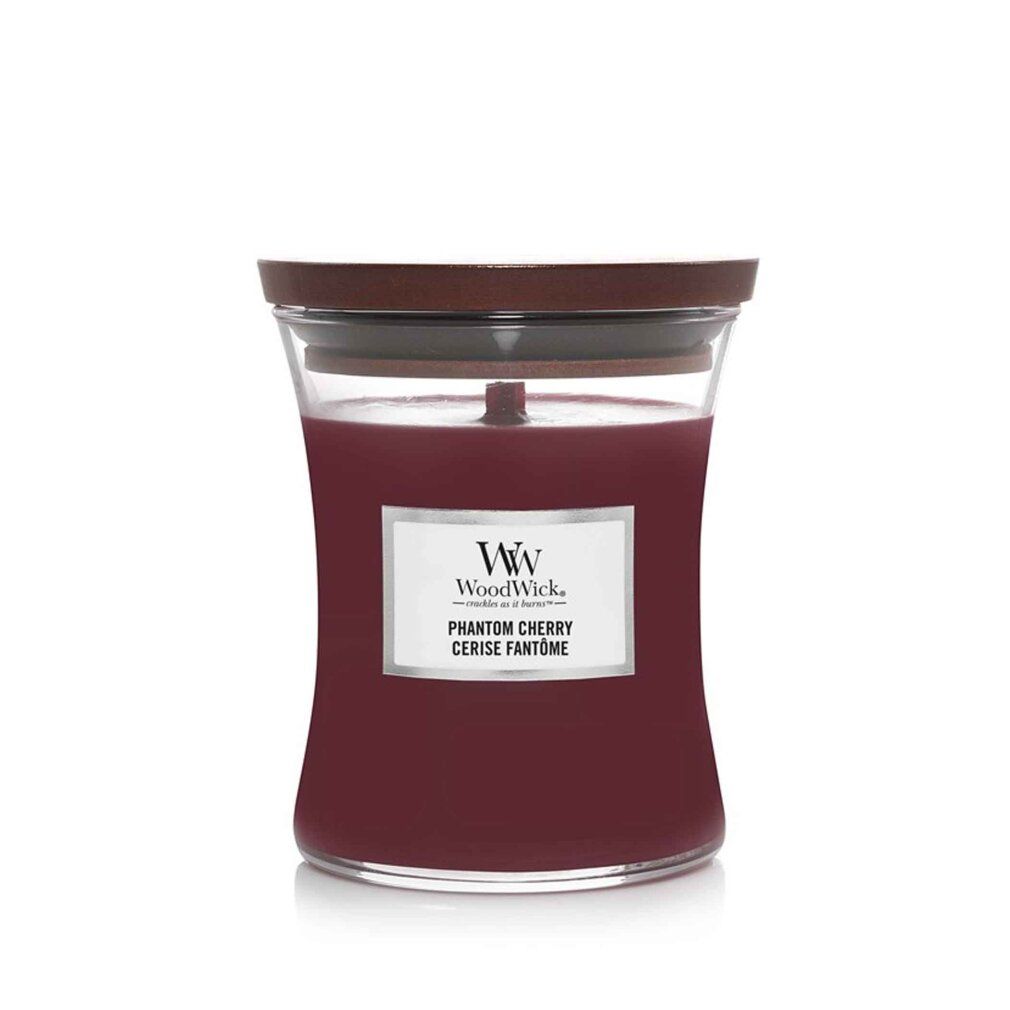 Kirschrote Kerze mit Holzdocht und Deckel. Auf dem Etikett steht WoodWick, Phantom Cherry, Cerise Fantôme.