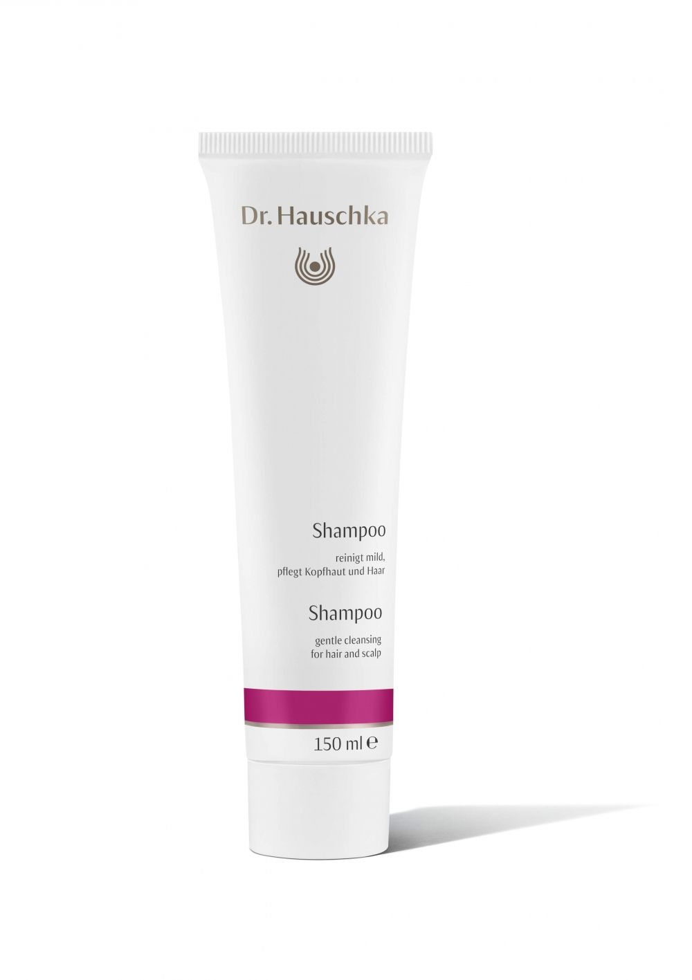 Weiße Tube mit Produktnamen und Logo. Text: Shampoo, reinigt mild, pflegt Kopfhaut und Haar. 150 ml.