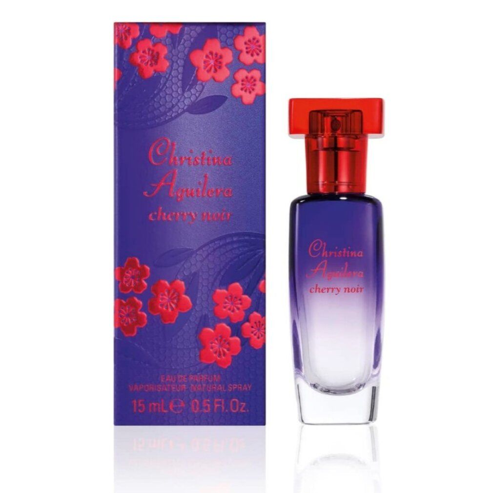 Flakon und Schachtel von Cherry Noir Eau de Parfum. Flakon blau-violett, roter Verschluss. Schachtel blau mit roten Blüten und Schriftzug.