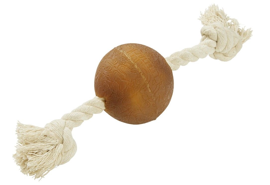 Ball aus Naturkautschuk mit Seil. Braune Kugel mit eingeprägtem Muster, verbunden mit weißem Seil.
