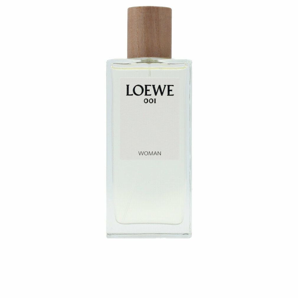 Loewe 001 Woman Edp Spray. Rechteckiger Glasflakon mit Holzverschluss. Weißes Etikett mit Logo und Schriftzug.