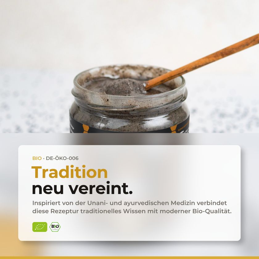 Glas BIO Schwarzkümmel in Honig mit Holzspatel, inspiriert von Unani- und ayurvedischer Medizin.