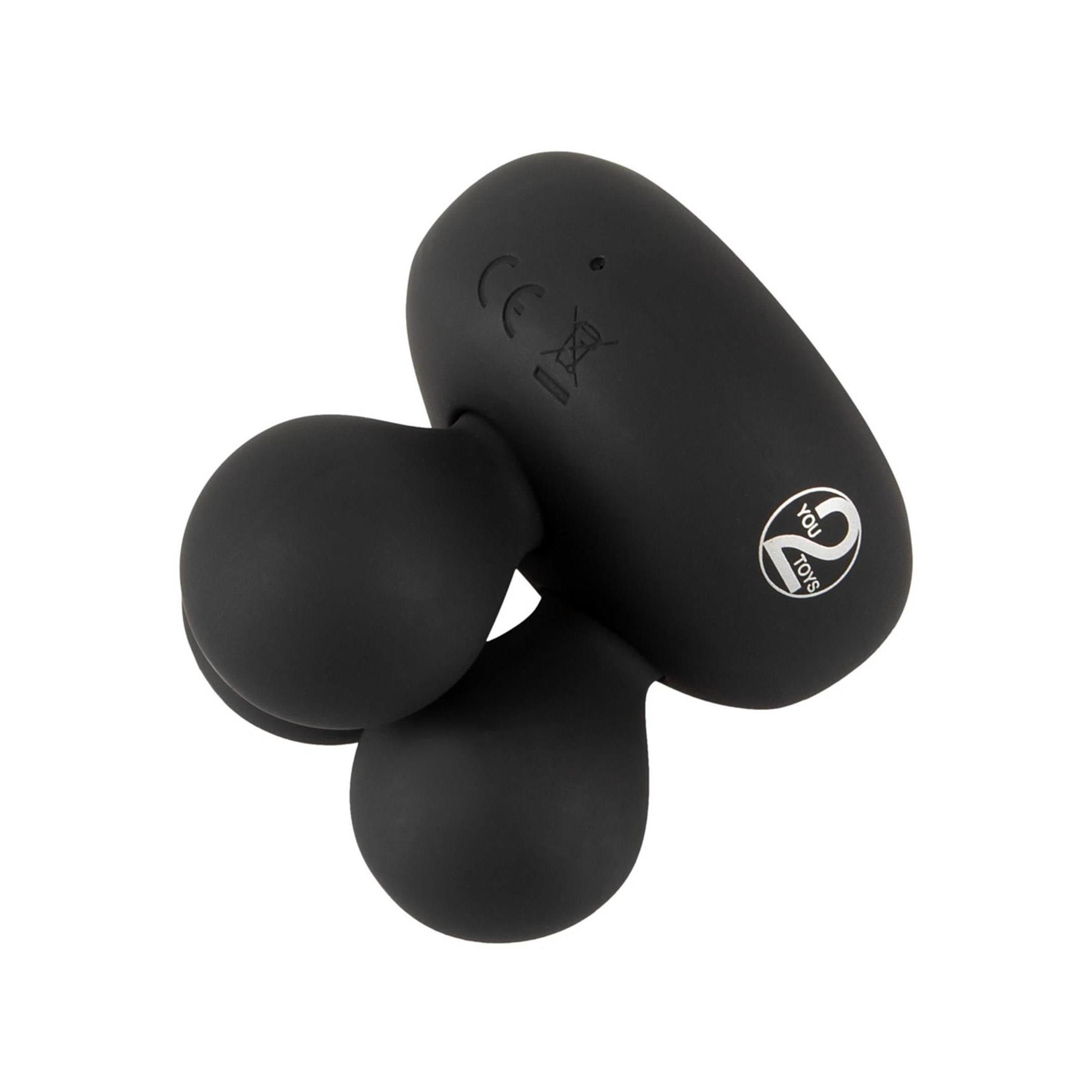 Schwarzes Massagegerät mit drei kugelförmigen Füßen. Logo mit der Zahl 2.