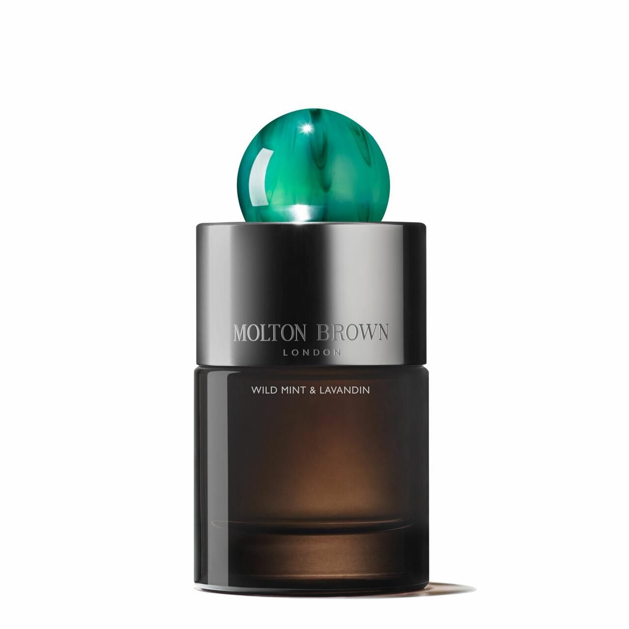 Dunkelbraune Glasflasche mit grünem Deckel. Aufschrift: Molton Brown London, Wild Mint & Lavandin.