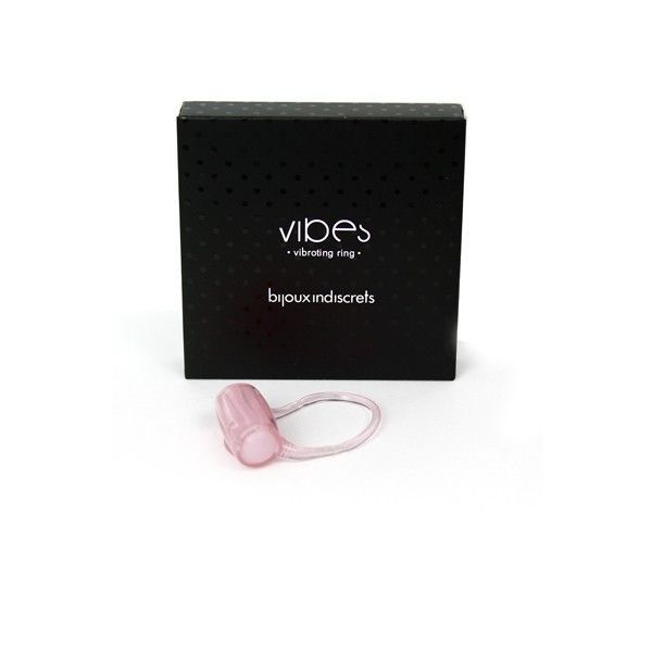 Schwarze Schachtel mit 'vibes' und 'bijouxindiscrets' Schriftzug. Rosa Vibrationsring daneben.