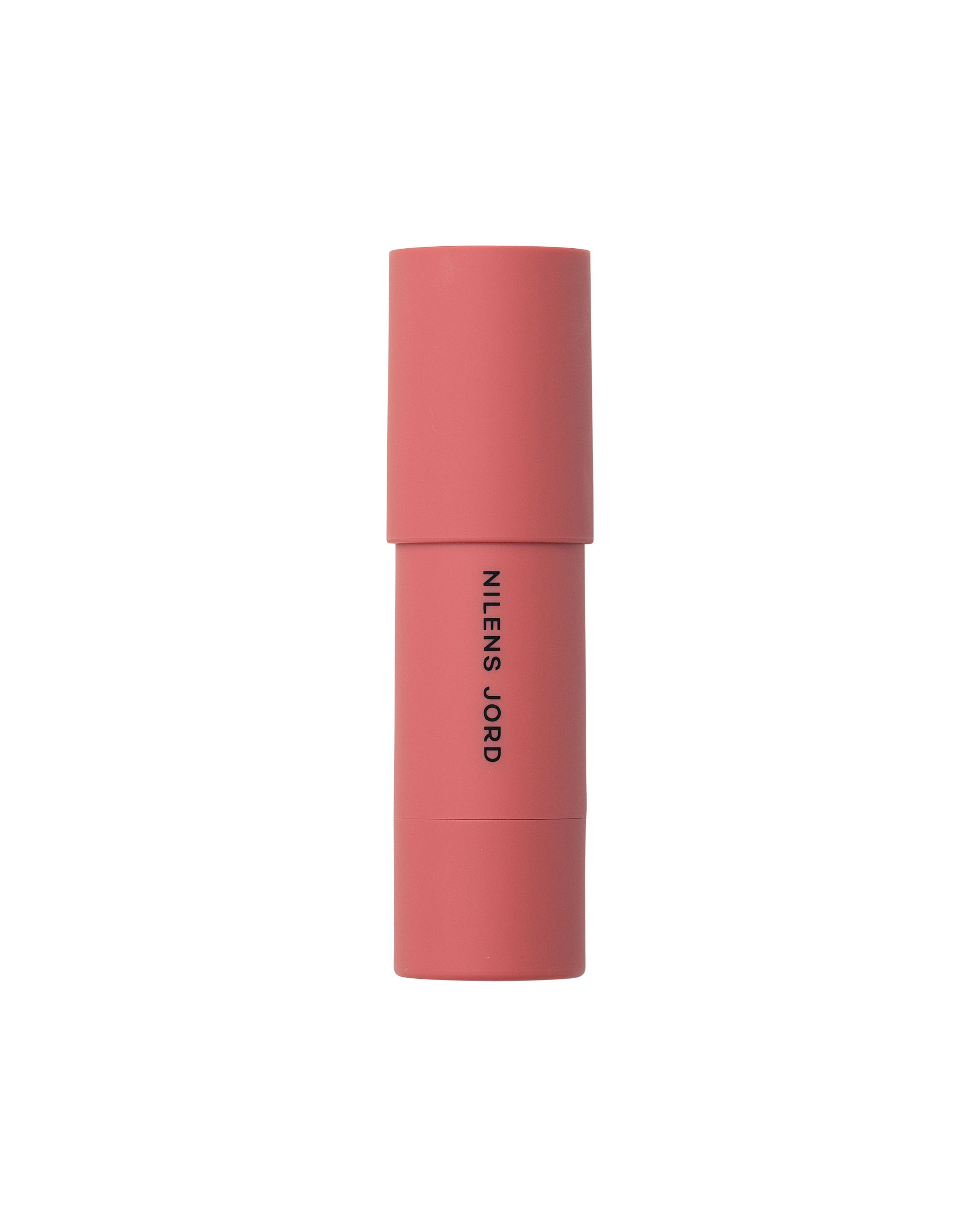 Nilens Jord Cheeks & Lips Stick in Koralle. Geschlossener Behälter mit Drehmechanismus.