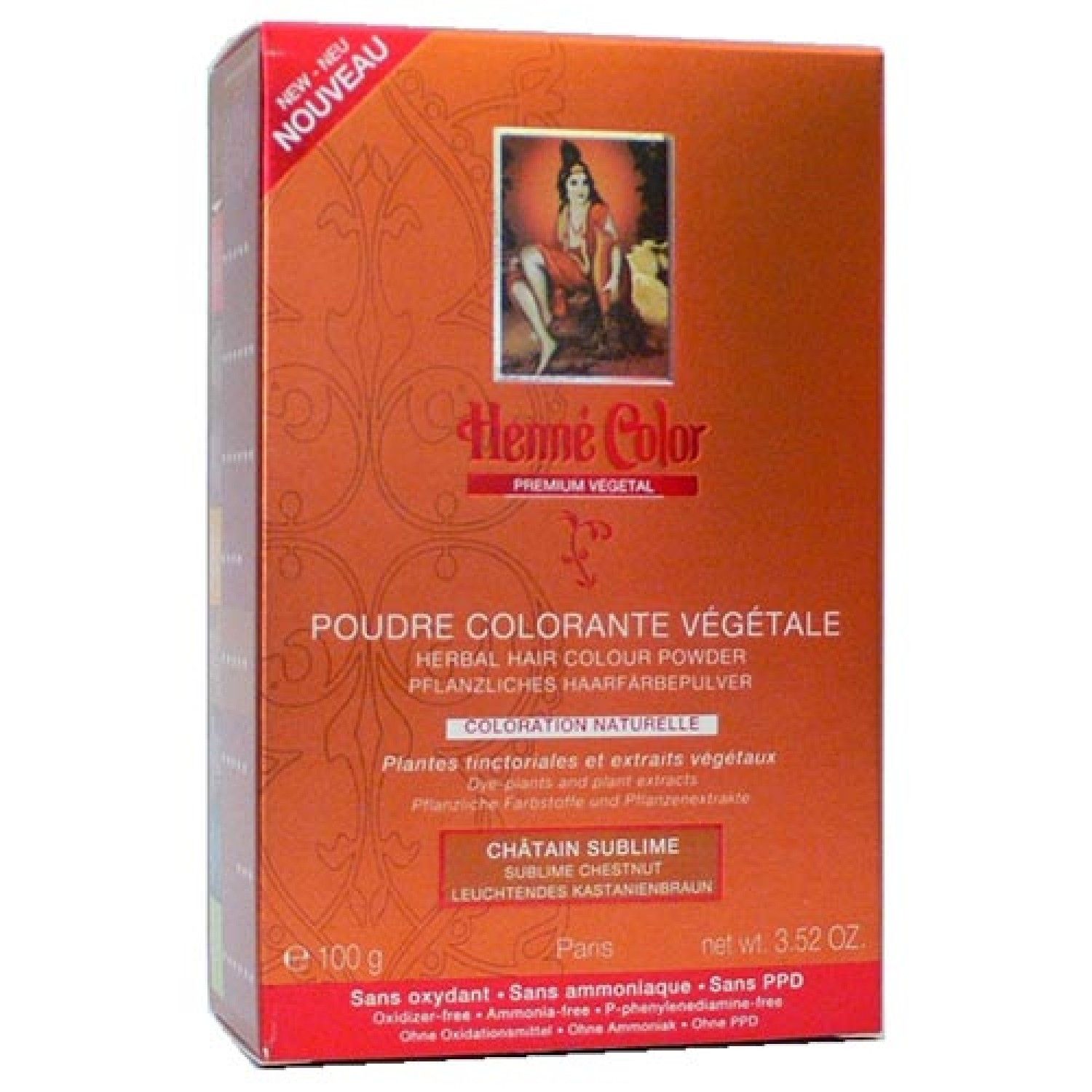 Karton mit Henné Color Premium Vegetal. Aufdruck: Poudre Colorante Végétale, Châtain Sublime. Orangefarbener Hintergrund, Bild einer Frau.