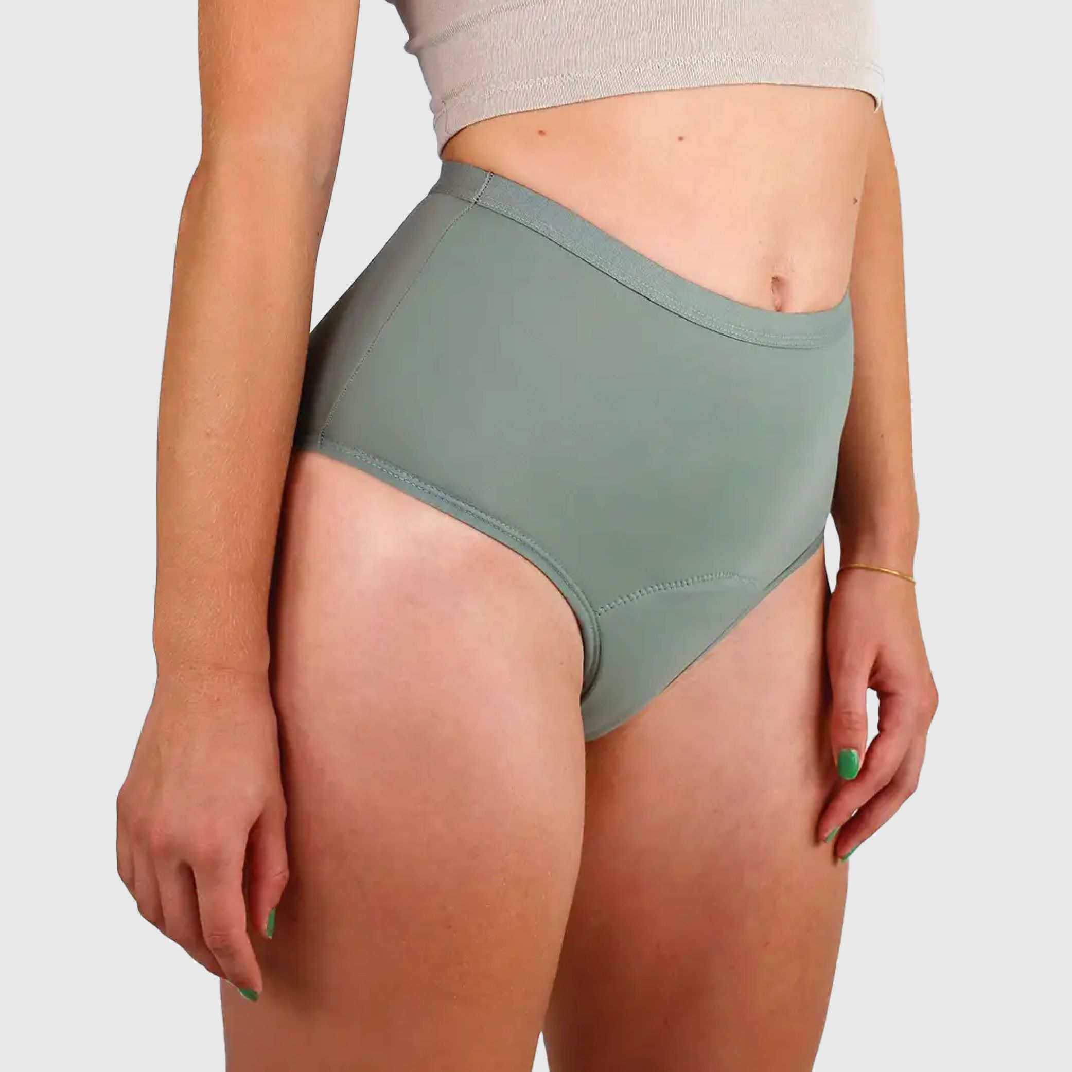 Seitenansicht einer grünen High-Waist Periodenunterwäsche, die den Bund und die Passform zeigt.