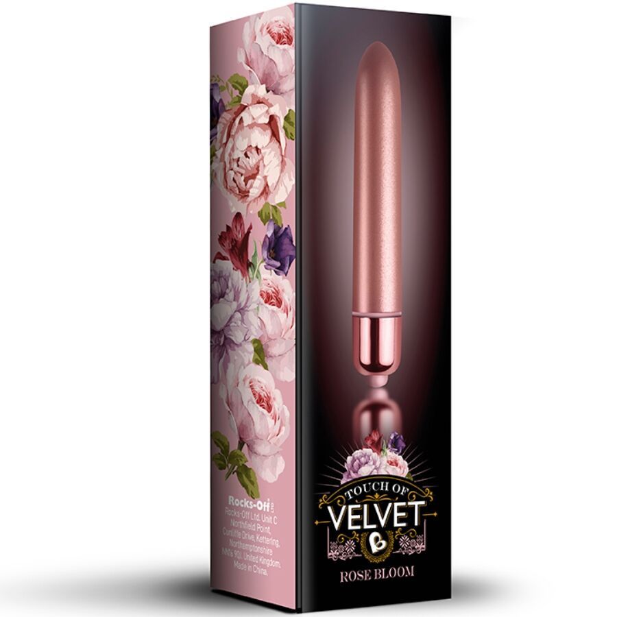 Rosa Vibrator in Verpackung mit Blumenmuster. Aufschrift: Touch of Velvet, Rose Bloom. Produktname: Rocks-off.