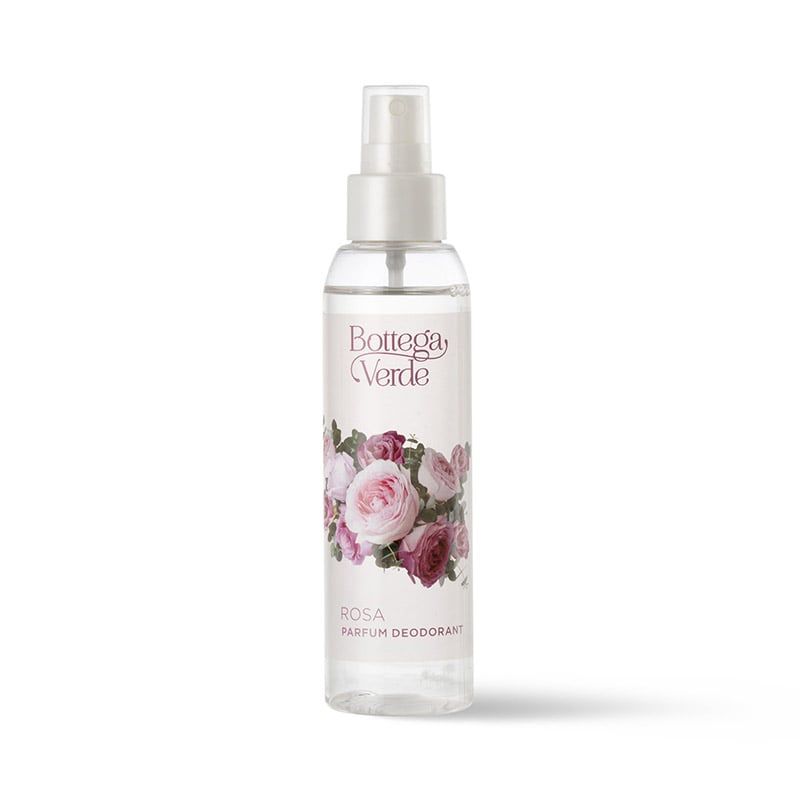 Bottega Verde Rosa Parfum Deodorant. Flacone spray trasparente con tappo bianco. L'etichetta mostra rose e la scritta "Rosa Parfum Deodorant".