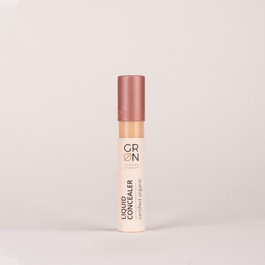 GRN Liquid Concealer. Beige Tube mit rosafarbenem Deckel. Aufschrift: Liquid Concealer, certified organic.